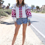 Coachella Day 1 in Free People Embroidered Jacket and Levi’s Shorts