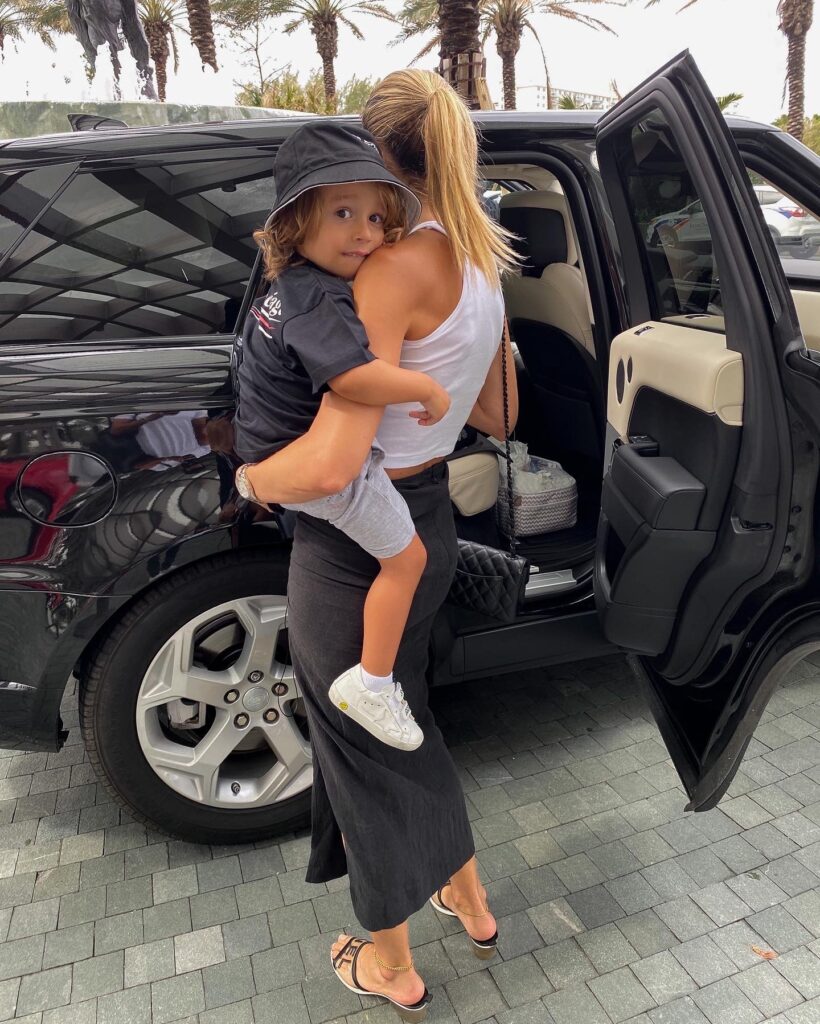 natalie rolt skirt, miami style, kids balenciaga, kids balenciaga t-shirt, kids golden goose, kids molo bucket hat, the perfect white tank, bottega veneta navigator sunglasses, bottega veneta bag, chanel sandals, the accessory junkie jewelry, trendy kids apparel, trendy toddlers, toddler style inspo, mom and toddler fashion inspo