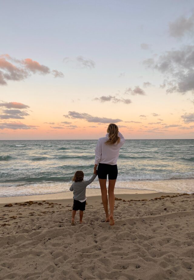 white hoodie, aritzia loungewear, aritzia hoodie, miami sunset, miami photoshoot, family photoshoot, mommy blogger, free people bike shorts, black bike shorts, trendy toddler, toddler style inspo