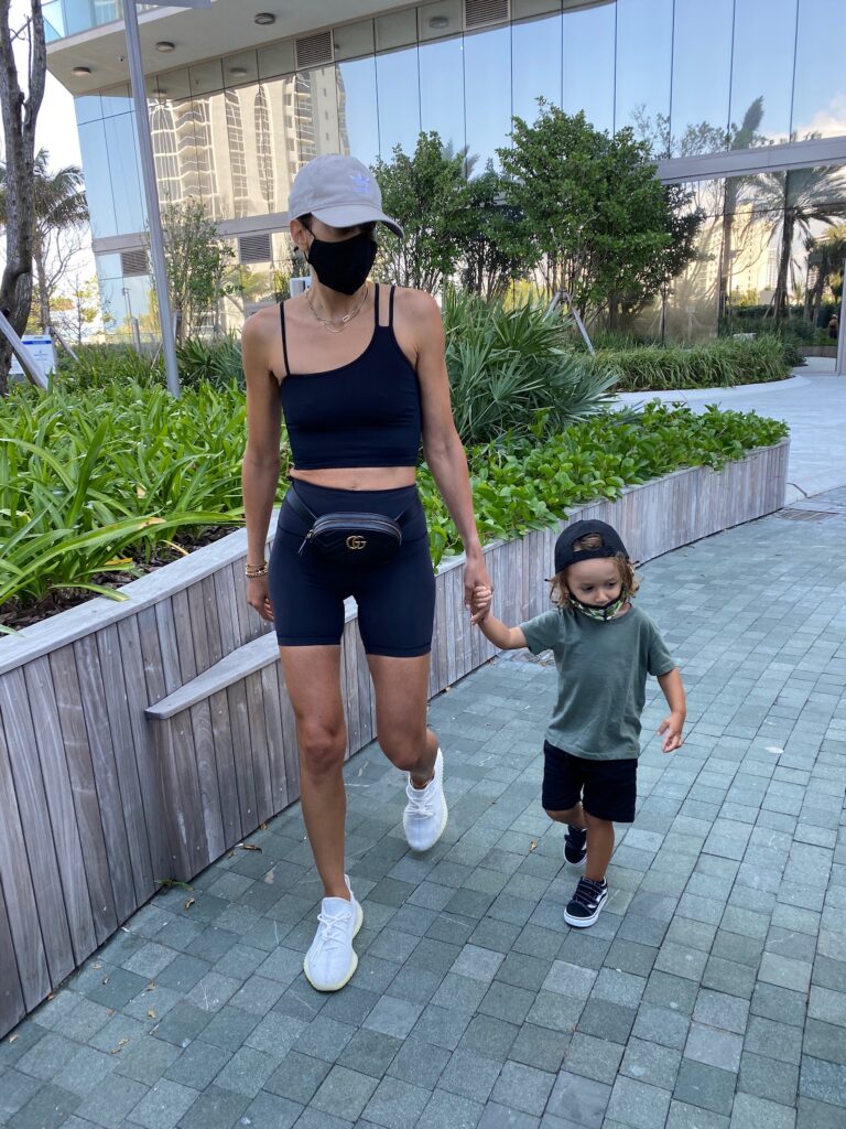 free people bike shorts, alo sports bra, activewear style inspo, activewear inspo, yeezy women, gucci beltbag, toddler style inspo, mommy blogger, fashion inspo, free people activewear, jennifer zeuner jewelry, gold jewelry inspo, electric picks jewelry, adidas hat women, neutral adidas hat