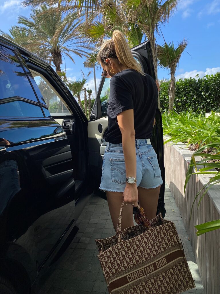 re/done denim shorts, re/done jean shorts, best selling denim shorts, basic black tshirt, goldie tees, basic must-have tee, hermes sandals, bottega veneta sunnies, best selling bottega veneta sunglasses, pool ootd, miami style inspo, dior tote look, hendrix hoops, electric picks jewelry inspo