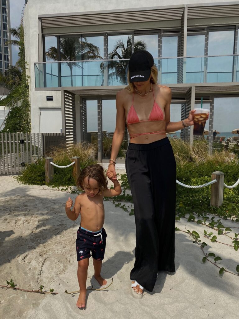 summer salt pants, summer salt cover-up pants, sommer swim bikini, wrap bikini top, strappy bikini top, balenciaga hat, toddler style inspo, beach style inspo, miami fashion, hey maeve jewelry, beach fashion inspo, oas company, hermes slides, toddler swim