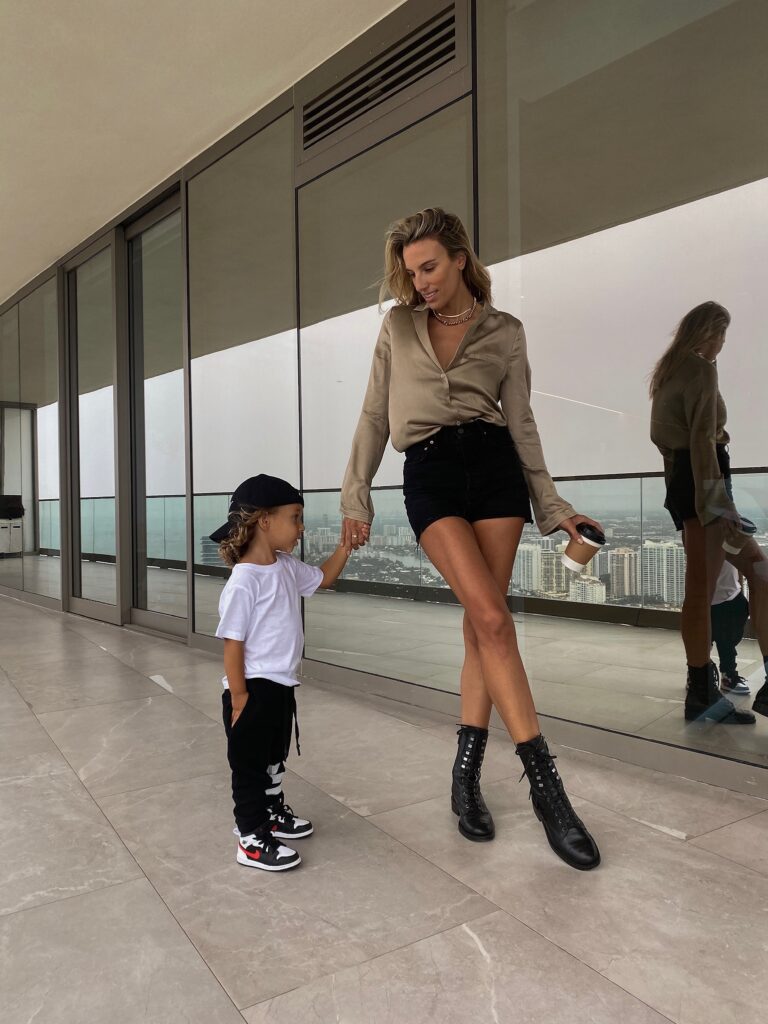 weekend stories top, weekend stories, revolve ambassador, revolve, grlfrnd, grlfrnd denim shorts, chanel combat boots, nununu triple stripe kids jogger, toddler nike dunks