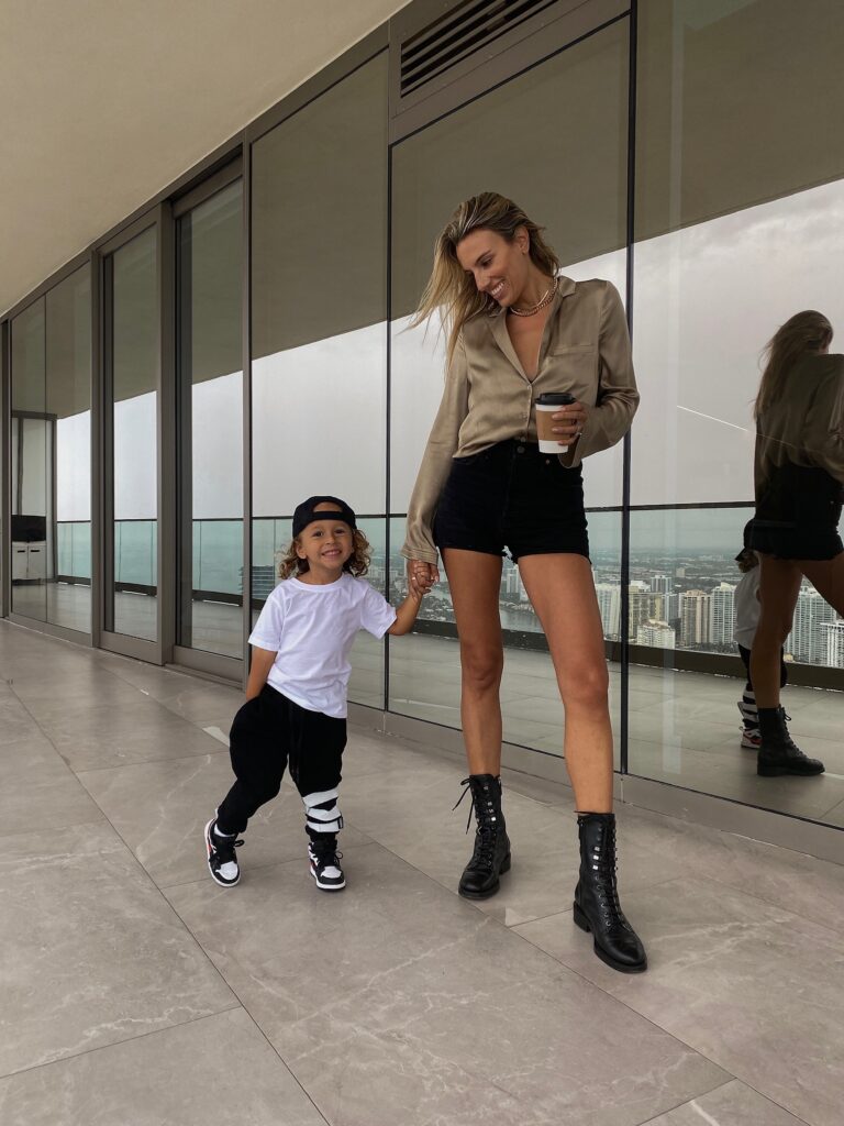 weekend stories top, weekend stories, revolve ambassador, revolve, grlfrnd, grlfrnd denim shorts, chanel combat boots, nununu triple stripe kids jogger, toddler nike dunks