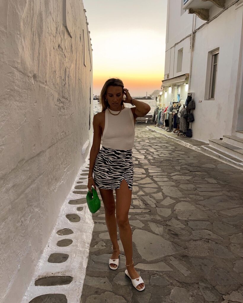 the line by k, the line by k ximeno tank, superdown, superdown black and white print mini skirt, mini skirt, prada sandals, bottega veneta green bag, bottega veneta, electric picks, vacations style inspo, beach style inspo
