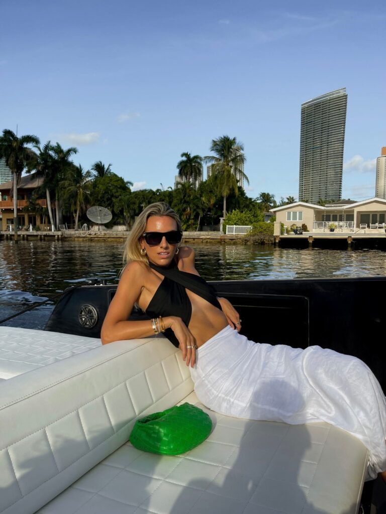 dissh skirt, white linen midi skirt, shein black crop top, halter neck crop top, chanel sandals, bottega veneta, bottega veneta sunglasses, bottega veneta jodie green bag, miami style inspo, miami fashion blogger, golden yacht charter