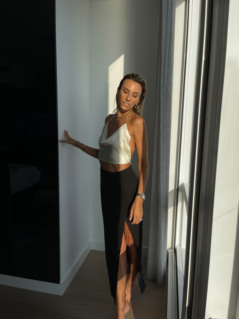subsurface tv top, strappy ivory cami, open back cami, natalie rolt skirt, natalie rolt midi skirt, hey maeve earrings, equinox hotel, equinox hotel nyc