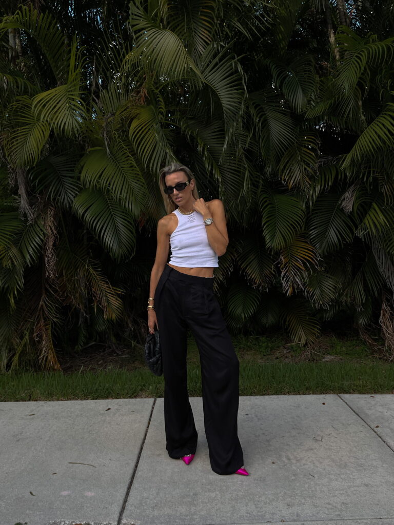 orseund iris tank, white logo tank, orseund iris, versace sunglasses, sunglass hut, black trouser, black wide leg trousers, zara black trousers, zara fall finds, balenciaga pink satin crystal embellished pumps, balenciaga pink pumps, bottega veneta black jodie bag