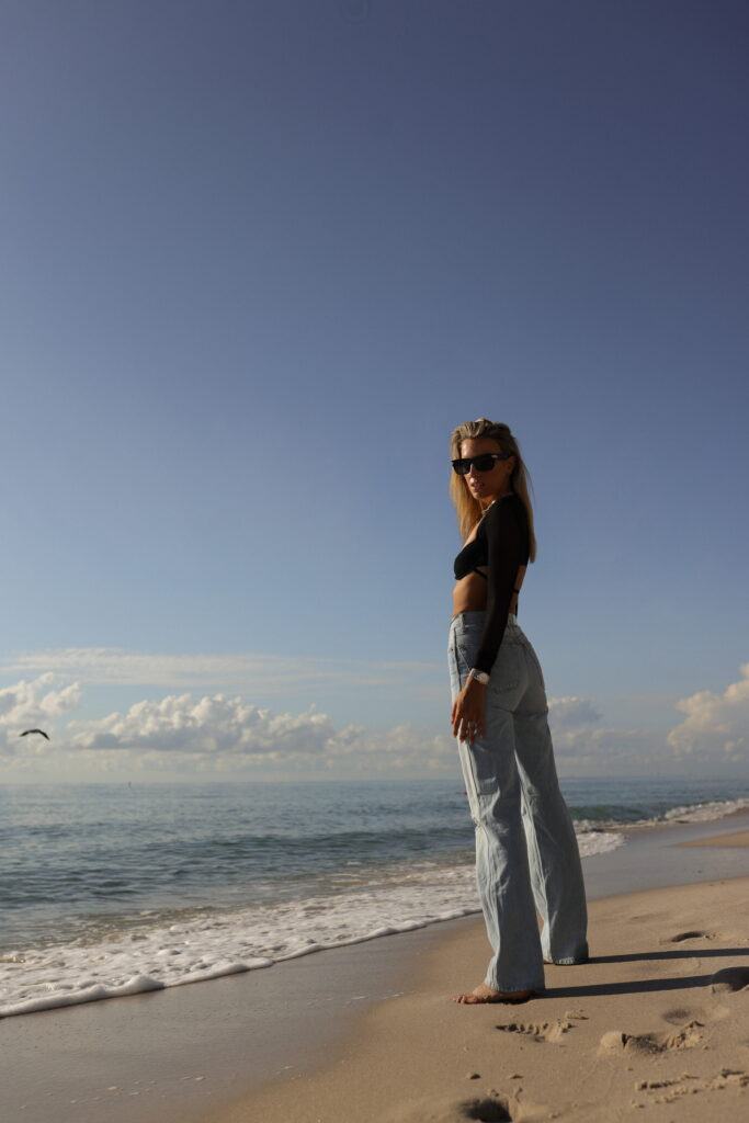 lioness mesh long sleeve top, black lioness crop top, redone jeans, bottega veneta sunnies, beach photoshoot