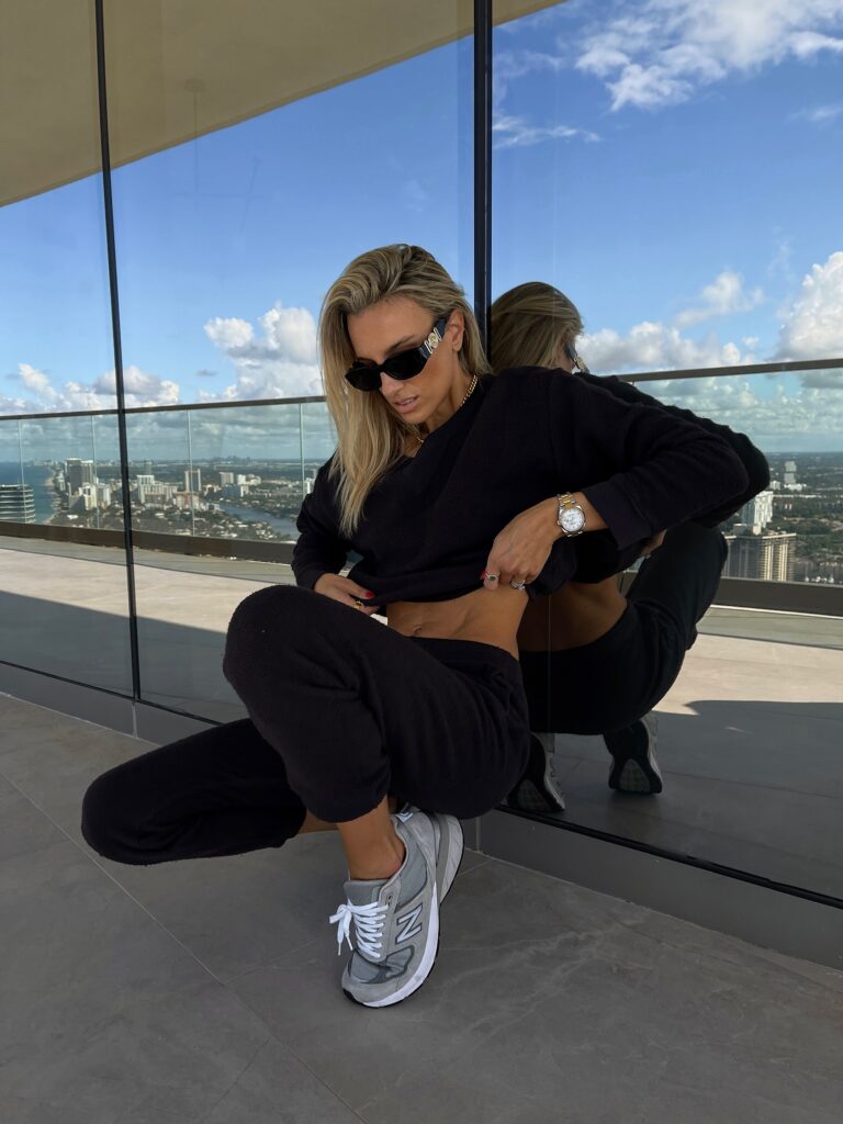 monrow, monrow loungewear set, monrow black loungewear set, black loungewear set, black sweatpants, black crew neck sweatshirt, versace sunglasses, sunglass hut, new balance sneakers