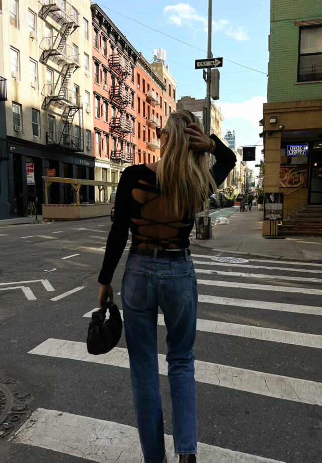 khaite top, khaite, black strappy top, redone jeans, bottega veneta jodie bag, street style