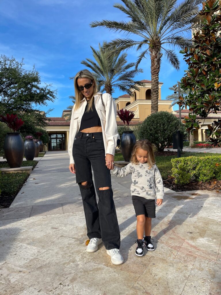 amazon the drop, lisa amazon the drop, lisadnyc, nike dunks, trending nike sneakers, wsly tank, bandier tank, faux leather shacket, luxury sunnies, prada sunglasses, redone jeans, 90s redone jeans, revolve, mickey mouse top, toddler nike dunks, toddler style inspo, disney trip